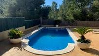 Swimming pool of House or chalet for sale in Calafell  with Air Conditioner, Terrace and Swimming Pool