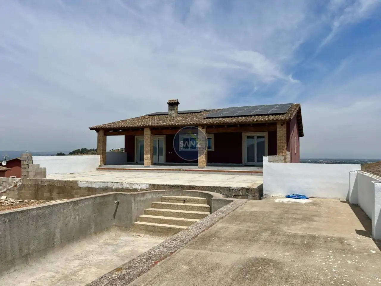 Vista exterior de Casa o chalet en venta en L'Énova con Aire acondicionado, Jardín privado y Terraza
