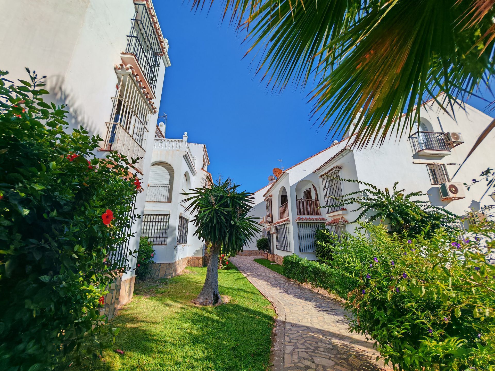 Exterior view of Duplex for sale in Torrox  with Air Conditioner, Terrace and Storage room