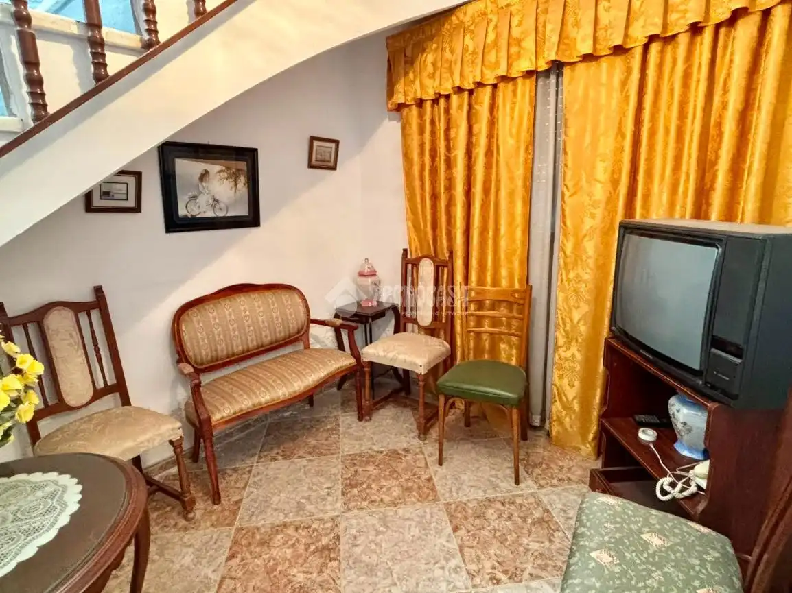 Sala d'estar de Casa adosada en venda en Jódar amb Terrassa i Balcó