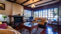 Living room of House or chalet for sale in Gijón   with Heating, Private garden and Parquet flooring