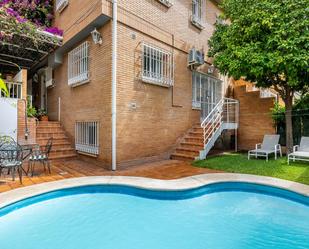 Swimming pool of Single-family semi-detached for sale in  Sevilla Capital  with Air Conditioner and Swimming Pool