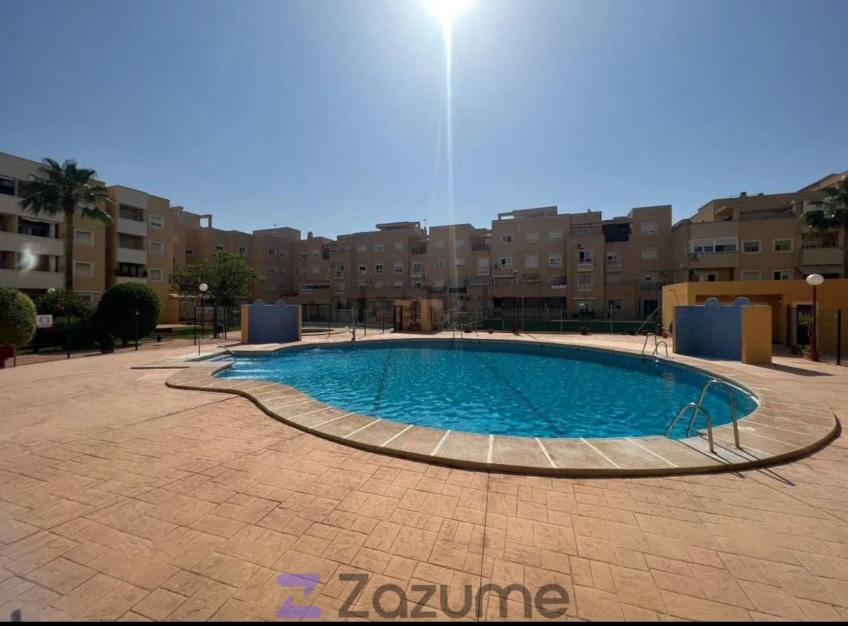 Swimming pool of Flat to rent in Roquetas de Mar  with Air Conditioner, Private garden and Terrace