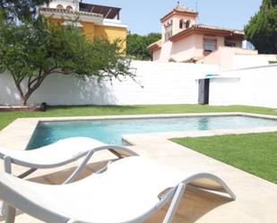 Piscina de Casa o xalet de lloguer en Chiclana de la Frontera amb Aire condicionat, Jardí privat i Terrassa