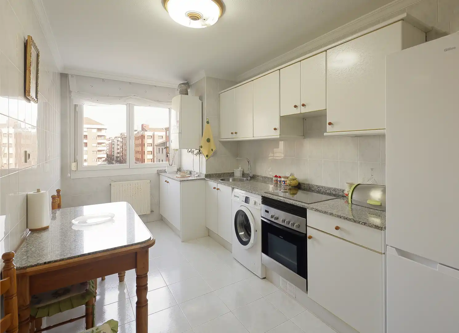 Kitchen of Flat for sale in Gijón   with Heating, Parquet flooring and Storage room