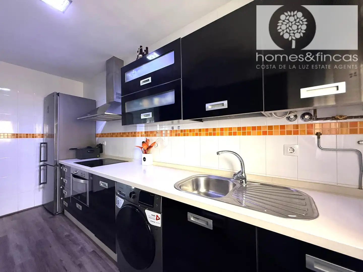 Küche von Wohnung zum Verkauf in Ayamonte mit Klimaanlage und Balkon
