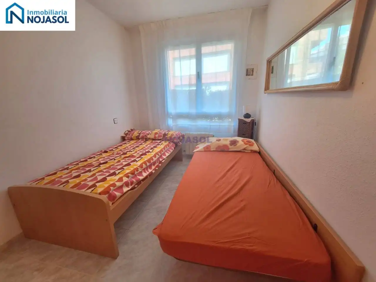 Dormitori de Apartament de lloguer en Noja amb Calefacció, Jardí privat i Terrassa