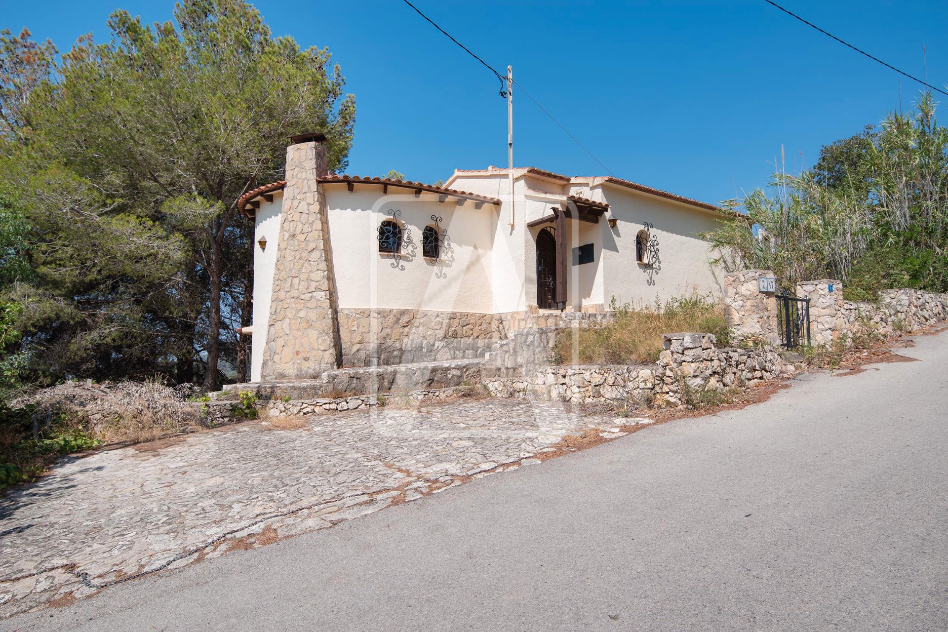 Vista exterior de Casa o xalet en venda en Benissa amb Jardí privat i Traster
