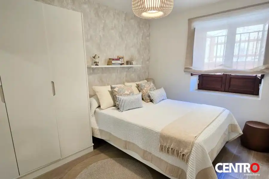 Dormitori de Apartament de lloguer en Granada amb Aire condicionat
