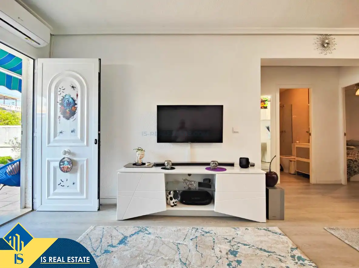 Sala de estar de Casa adosada en venta en Torrevieja con Aire acondicionado, Calefacción y Jardín privado