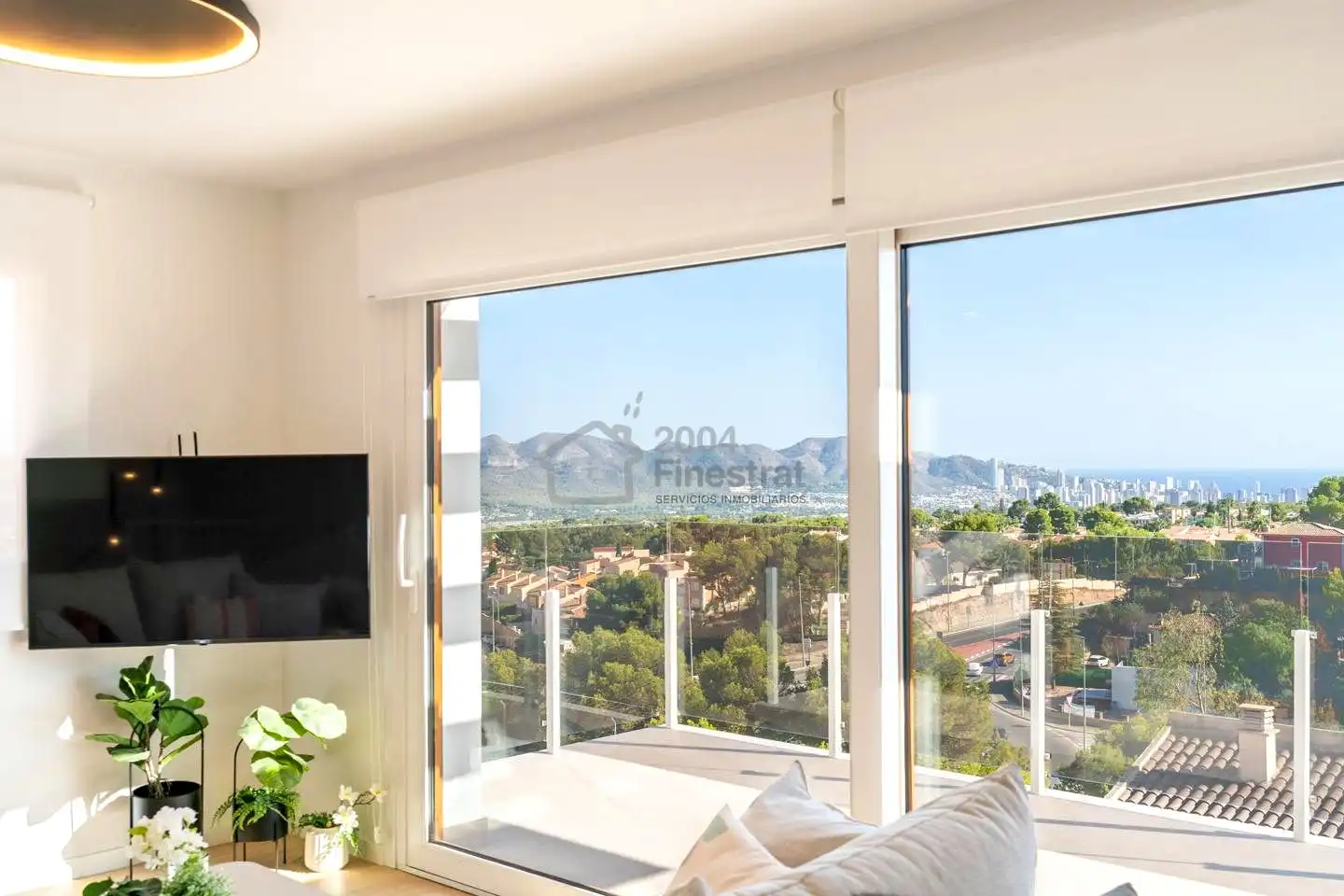 Sala de estar de Casa adosada en venta en La Nucia con Aire acondicionado, Jardín privado y Terraza