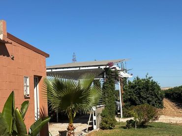 Casa rústica amb piscina en venda a Cantillana