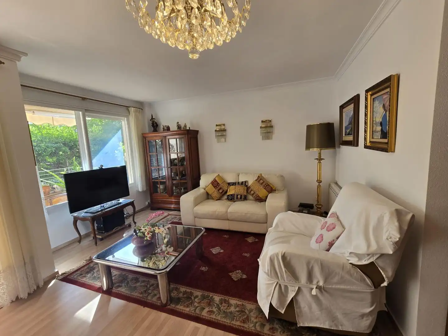 Sala d'estar de Pis en venda en Calvià amb Aire condicionat, Jardí privat i Terrassa