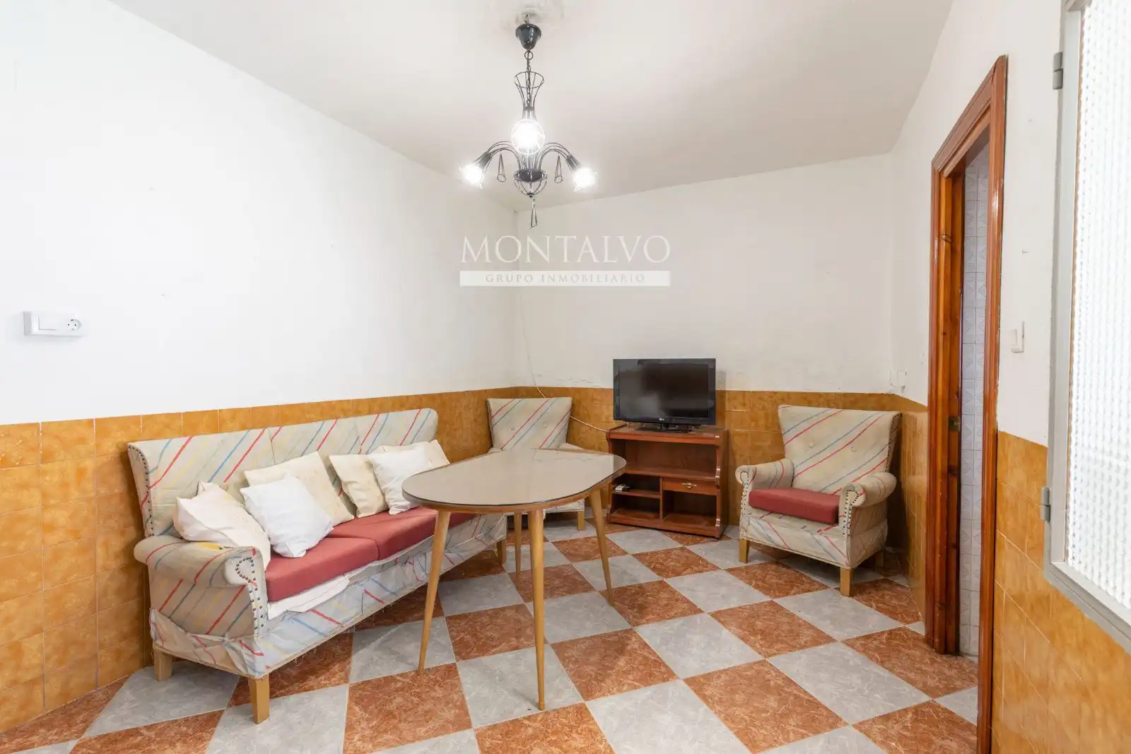 Sala d'estar de Casa adosada en venda en Atarfe