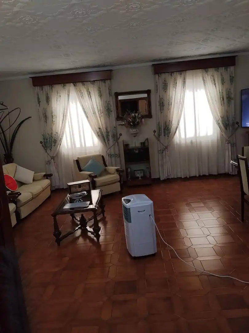 Sala d'estar de Finca rústica en venda en La Carlota amb Piscina