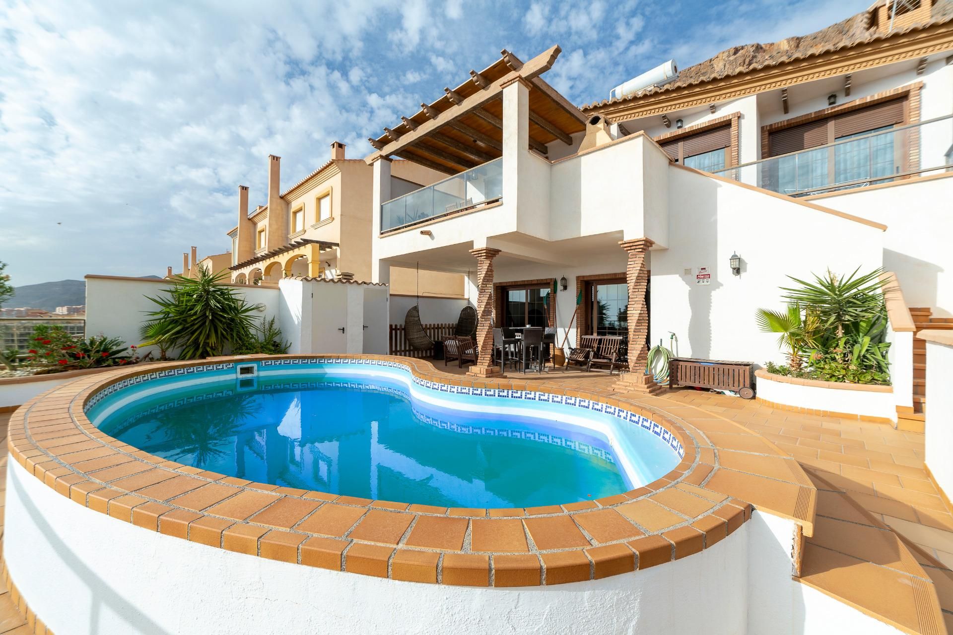 Exterior view of House or chalet for sale in Roquetas de Mar  with Air Conditioner, Terrace and Storage room