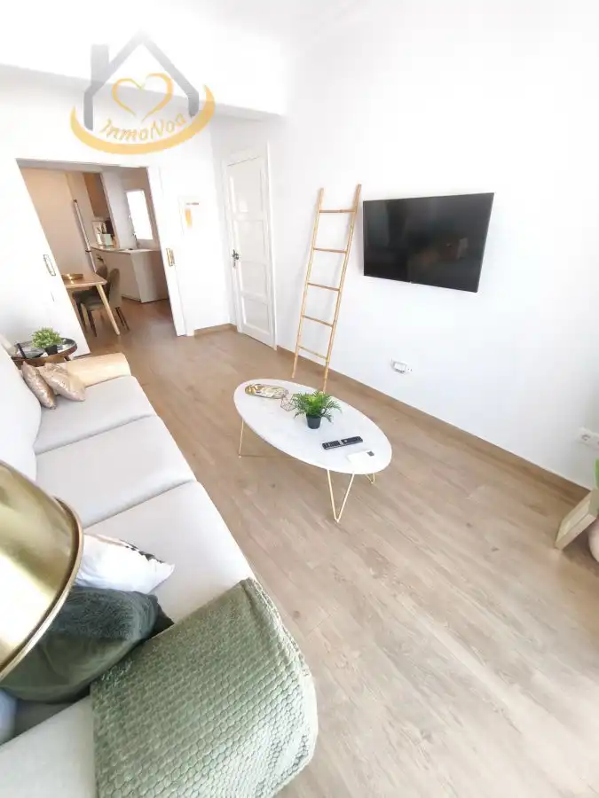 Sala de estar de Piso en venta en Cartaya con Aire acondicionado, Trastero y Amueblado