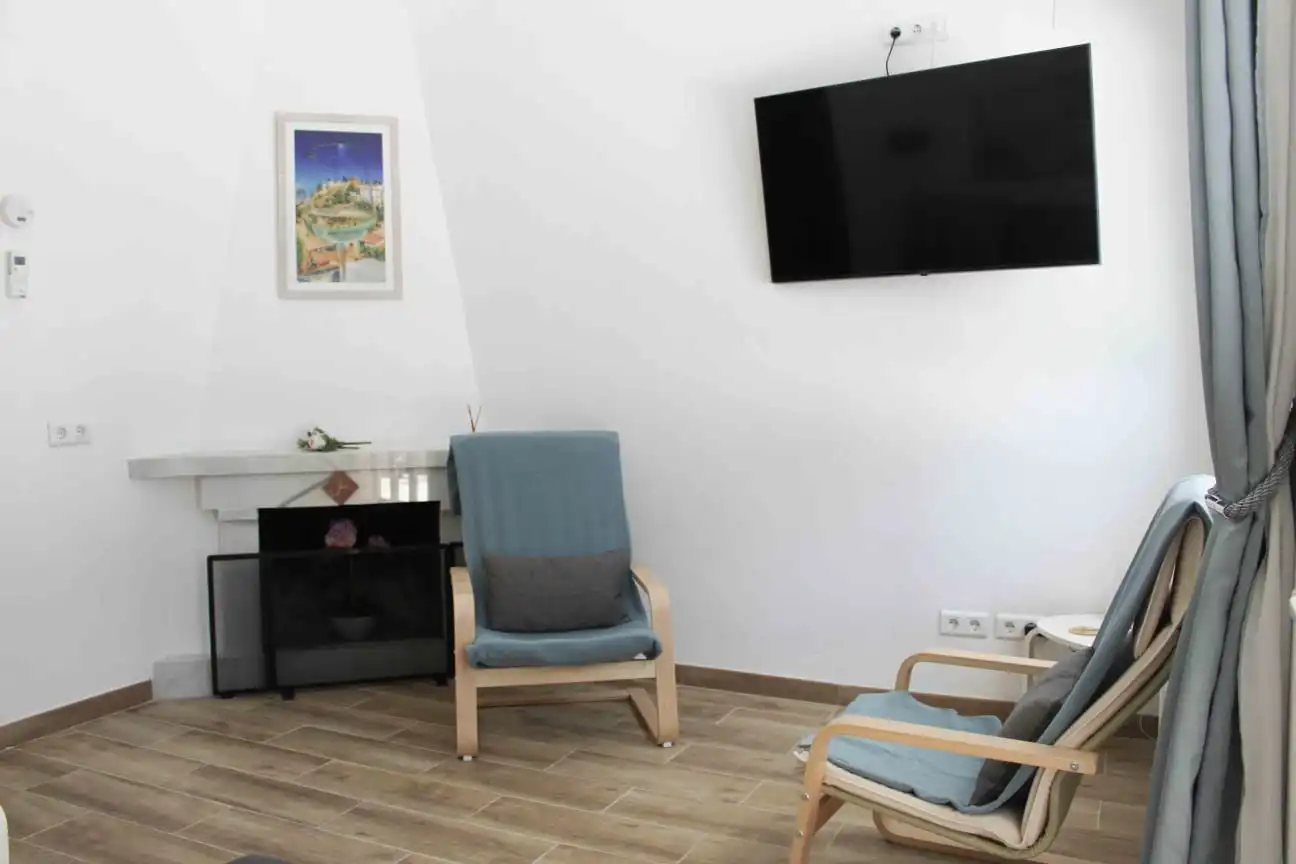 Sala d'estar de Casa adosada en venda en Vélez-Málaga amb Aire condicionat, Terrassa i Moblat