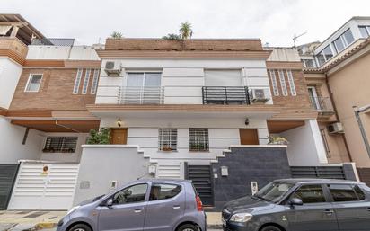 Exterior view of Single-family semi-detached for sale in Armilla  with Air Conditioner, Swimming Pool and Balcony