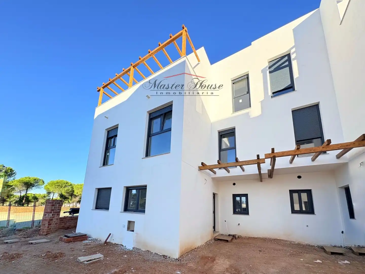 Vista exterior de Casa adosada en venta en Aljaraque con Calefacción, Jardín privado y Terraza