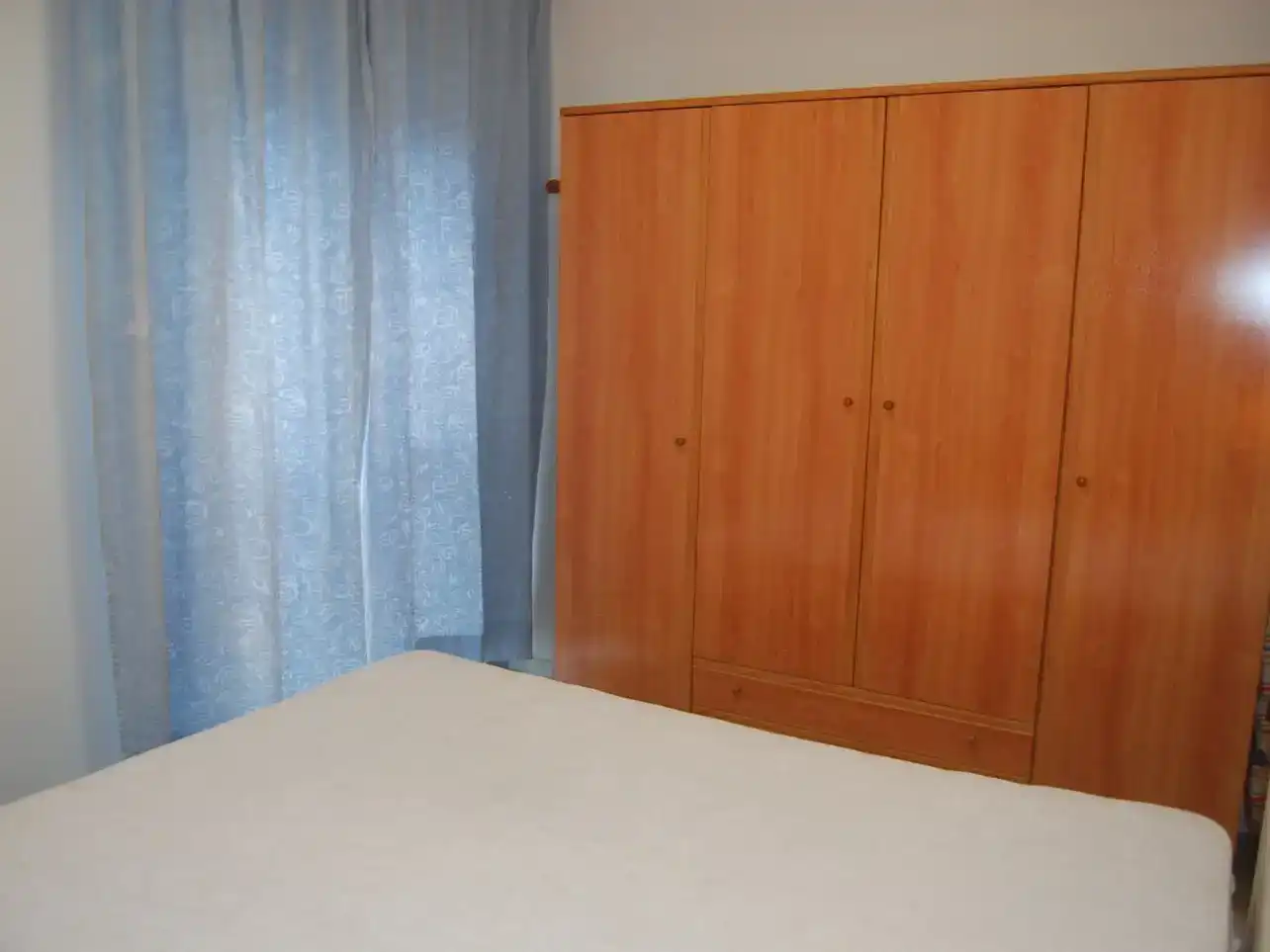 Dormitori de Apartament de lloguer en Algeciras amb Piscina