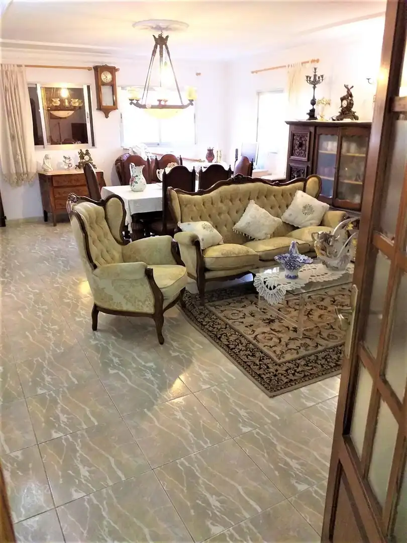 Sala d'estar de Casa o xalet en venda en Manises amb Aire condicionat, Jardí privat i Traster
