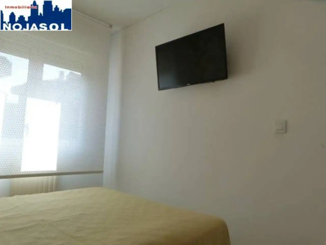 Dormitori de Apartament de lloguer en Arnuero amb Calefacció, Jardí privat i Terrassa