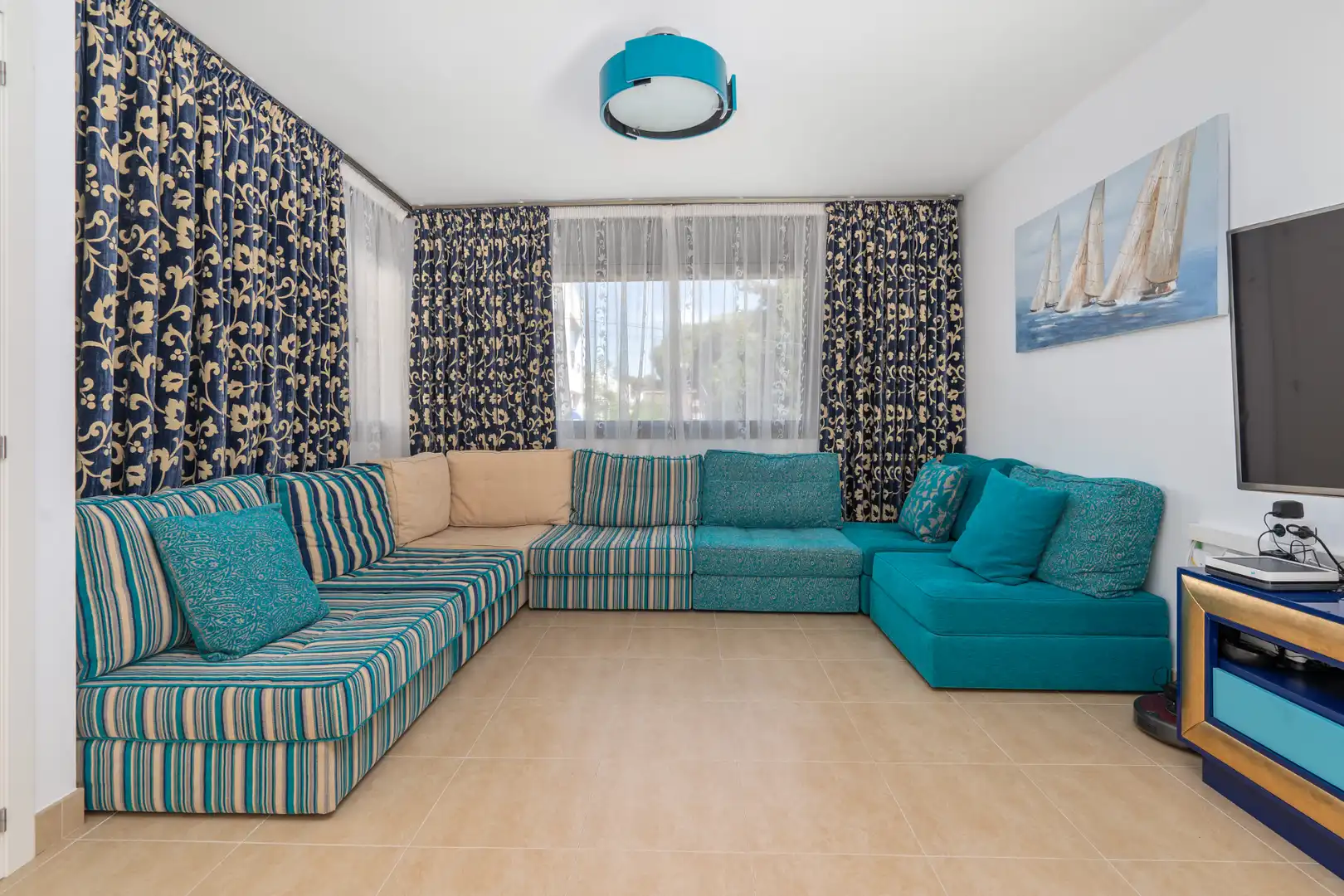 Sala de estar de Casa adosada en venta en Torredembarra con Aire acondicionado, Calefacción y Parquet