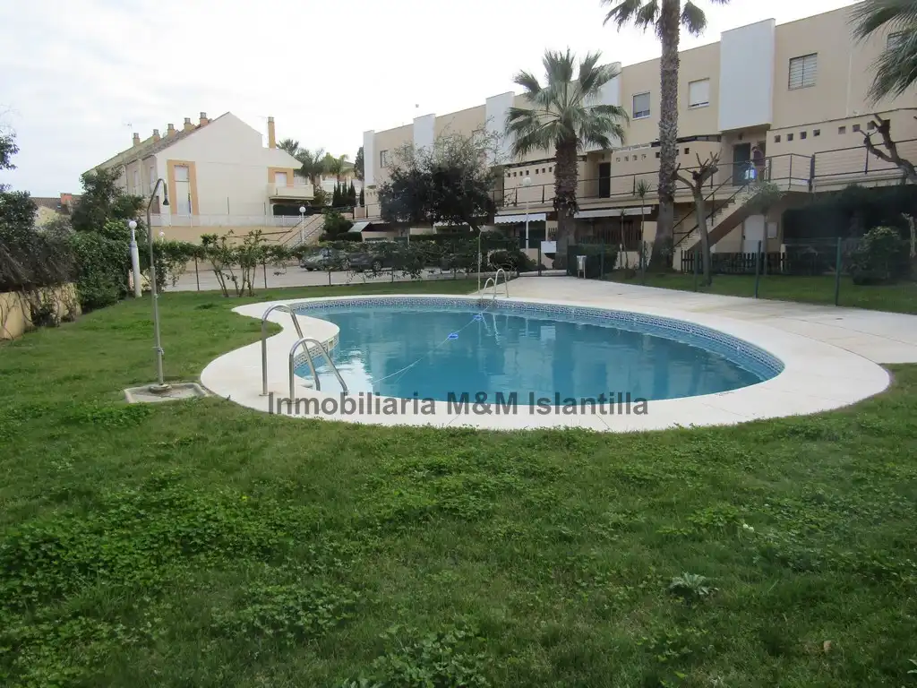 Piscina de Apartamento en venta en Islantilla con Terraza, Trastero y Amueblado