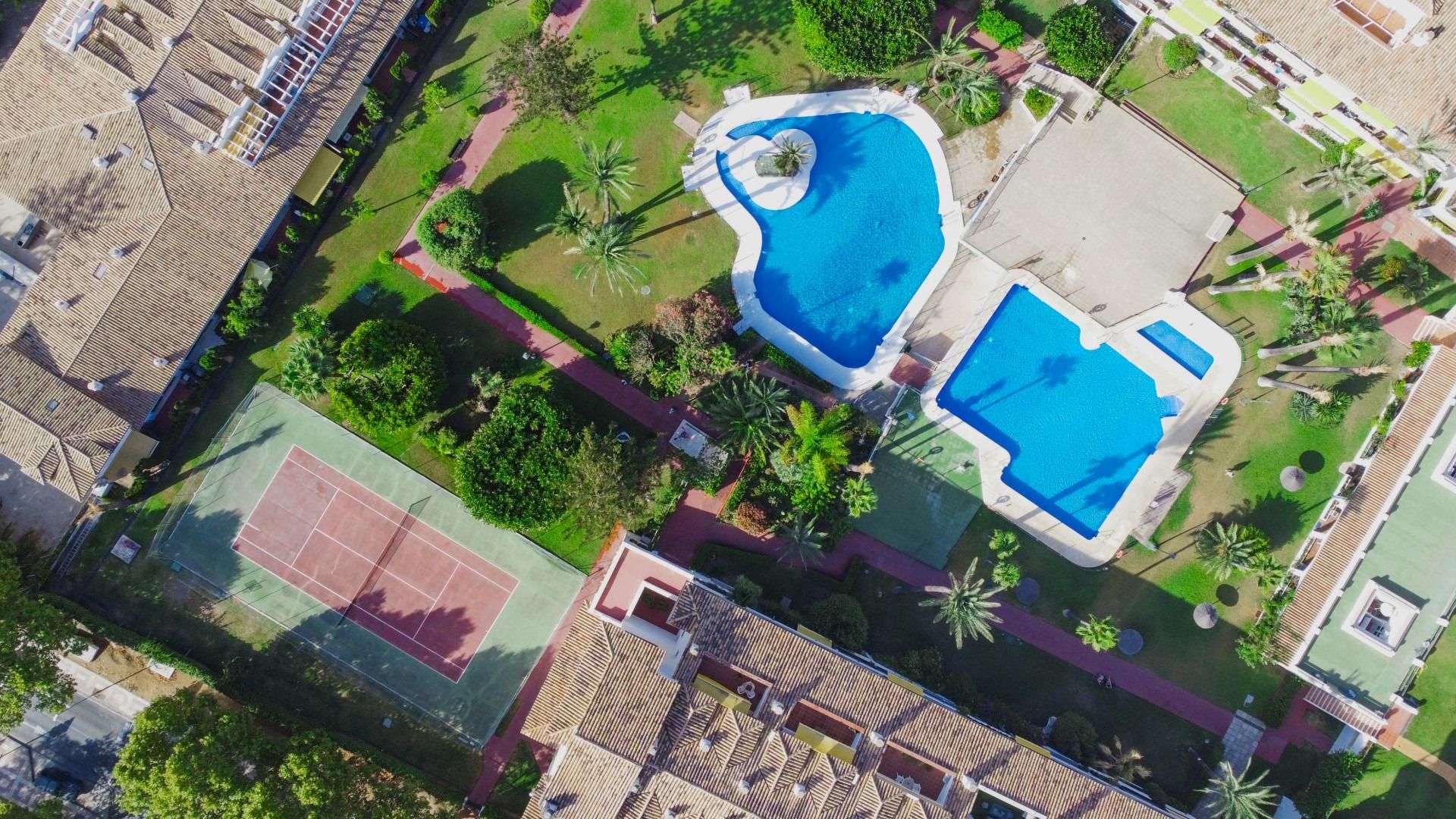 Swimming pool of Planta baja for sale in Marbella  with Air Conditioner, Private garden and Parquet flooring