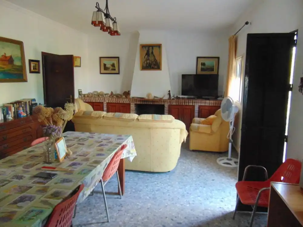Sala de estar de Finca rústica en venta en Lora del Río con Aire acondicionado, Calefacción y Terraza