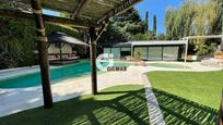 Swimming pool of House or chalet for sale in La Moraleja  with Air Conditioner, Private garden and Terrace