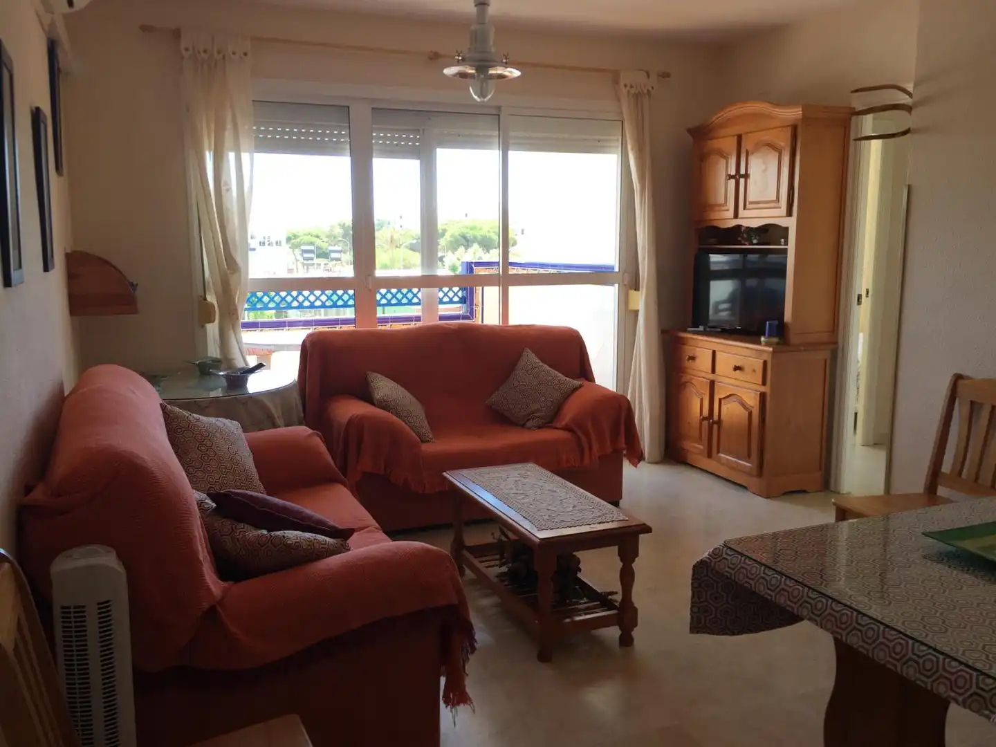 Sala de estar de Piso de alquiler en El Portil con Jardín privado, Terraza y Piscina