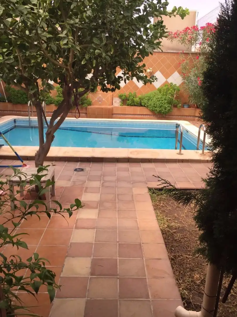 Piscina de Casa adosada en venta en Melilla con Aire acondicionado, Jardín privado y Terraza
