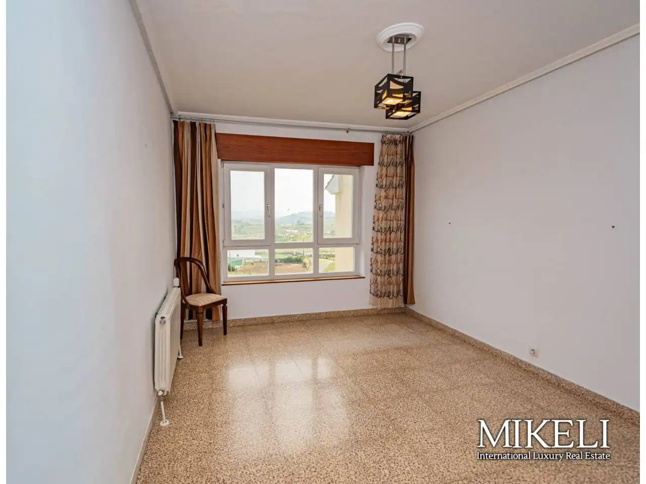 Sala d'estar de Casa o xalet en venda en Miengo amb Calefacció, Jardí privat i Terrassa