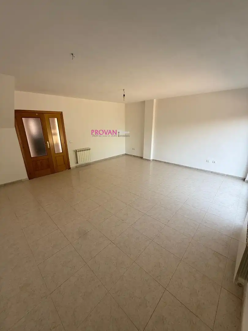 Sala de estar de Casa adosada en venta en Galápagos con Calefacción y Jardín privado
