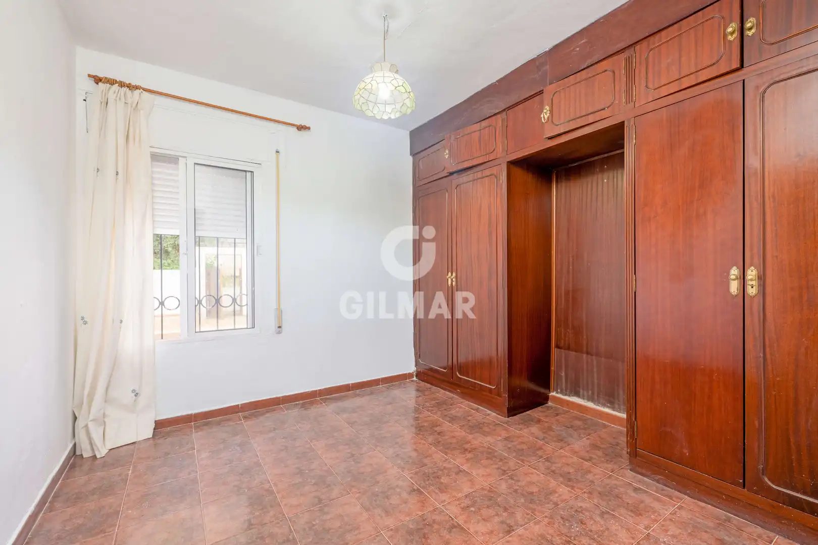 Dormitori de Casa adosada en venda en Chiclana de la Frontera amb Jardí privat