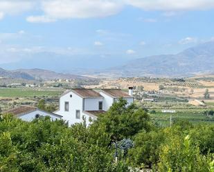 Vista exterior de Casa o xalet en venda en Pizarra amb Aire condicionat, Jardí privat i Piscina