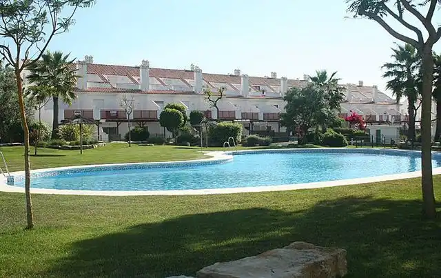 Jardí de Casa adosada de lloguer en El Portil amb Aire condicionat, Terrassa i Moblat