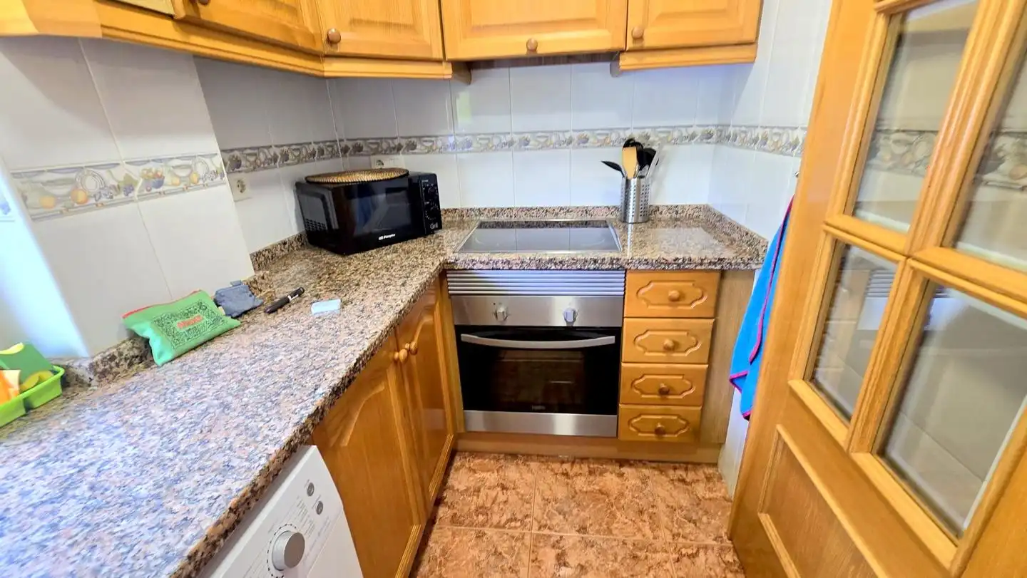 Kitchen of Apartments for rent in Gandia  with Air Conditioner, Terrace and Storage room