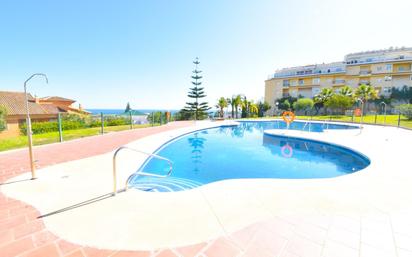 Swimming pool of Apartment for sale in Mijas  with Air Conditioner, Heating and Private garden