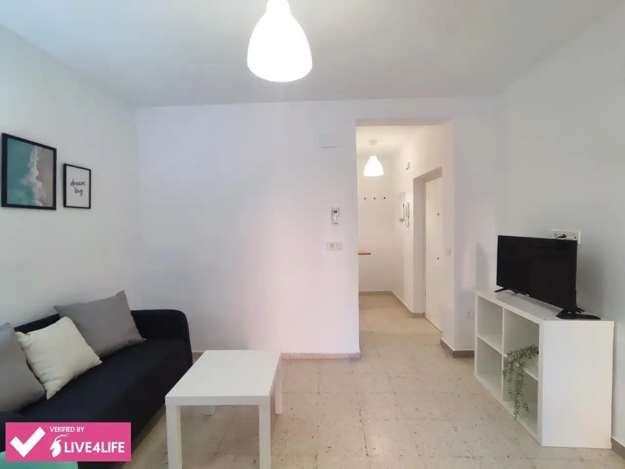 Sala d'estar de Pis en venda en Granada amb Aire condicionat i Moblat