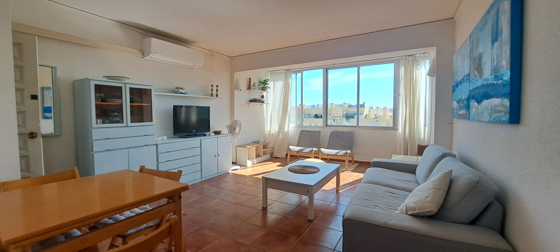 Sala d'estar de Apartament en venda en Dénia amb Aire condicionat, Terrassa i Moblat