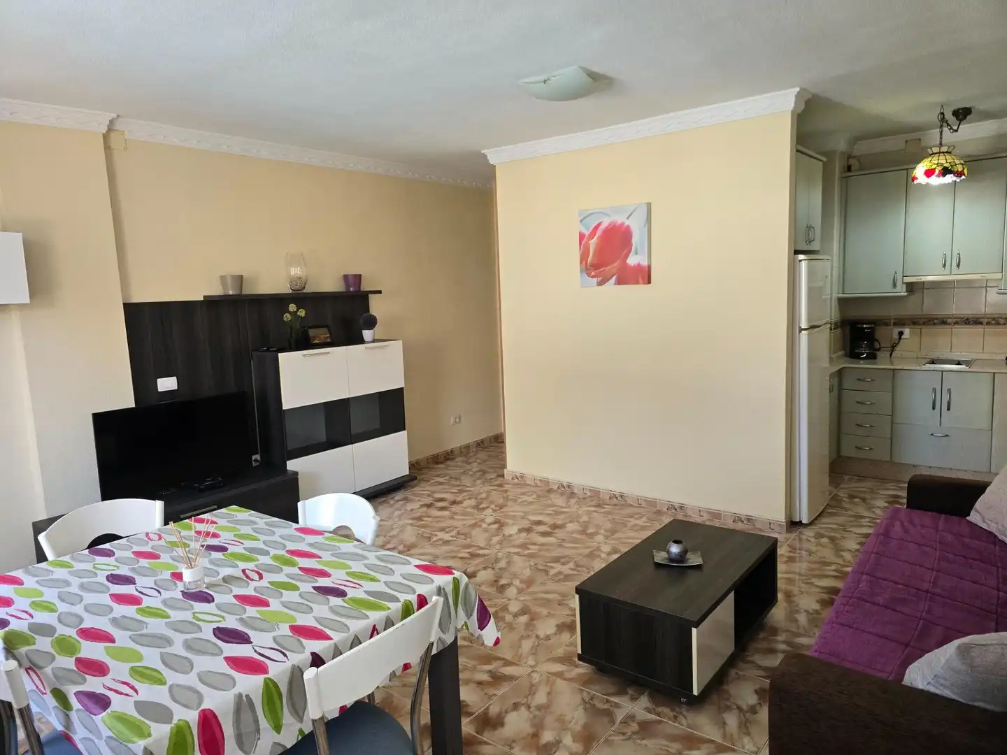 Sala d'estar de Apartament de lloguer en San Bartolomé de Tirajana amb Moblat i Piscina comunitària