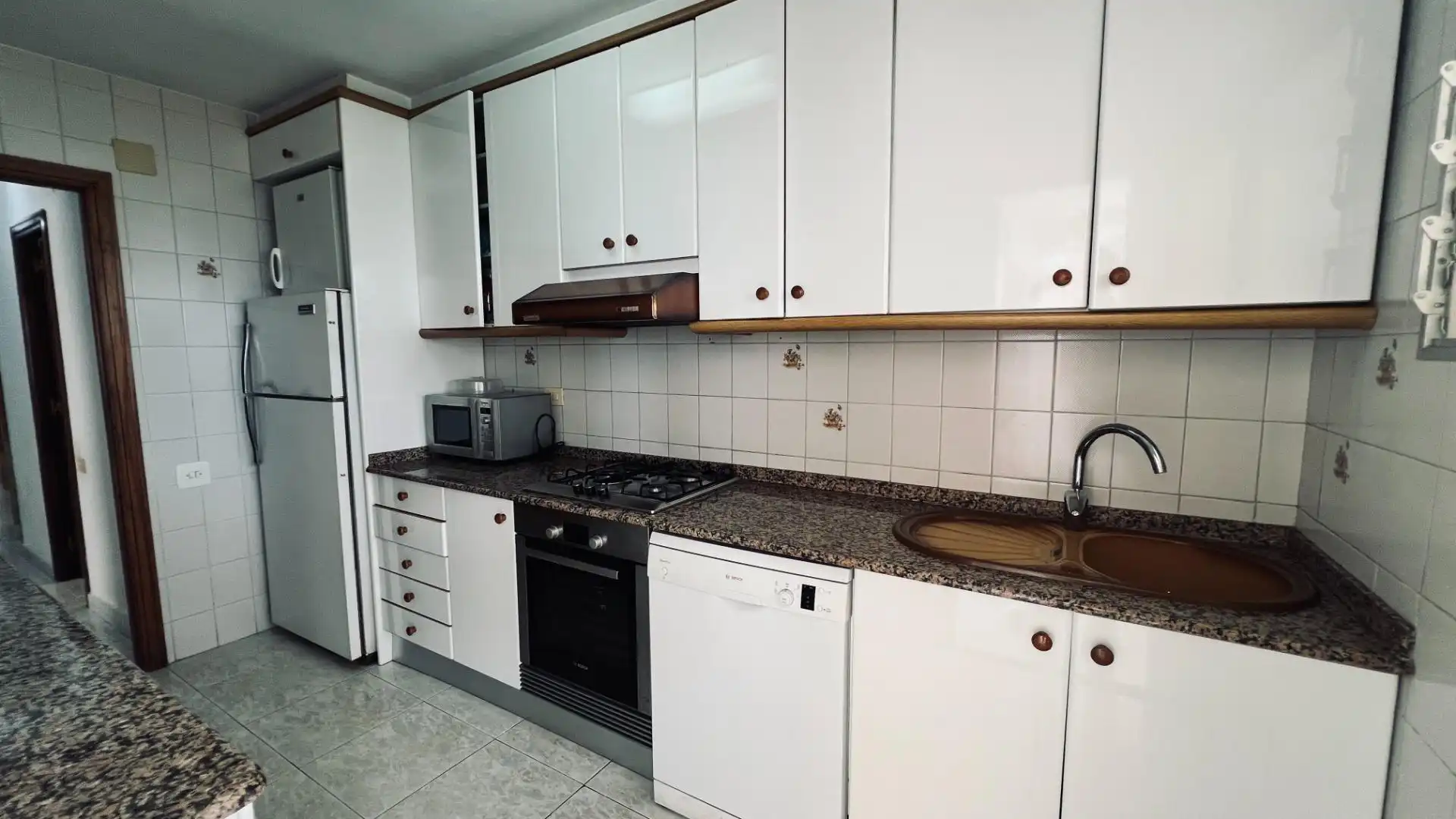 Cuina de Apartament en venda en Benicasim / Benicàssim amb Jardí privat, Terrassa i Traster