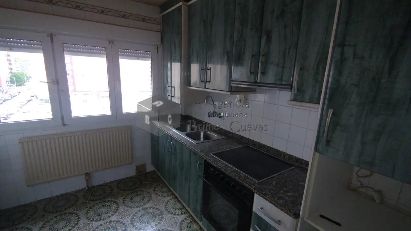 Kitchen of Flat for sale in Gijón   with Heating, Parquet flooring and Terrace