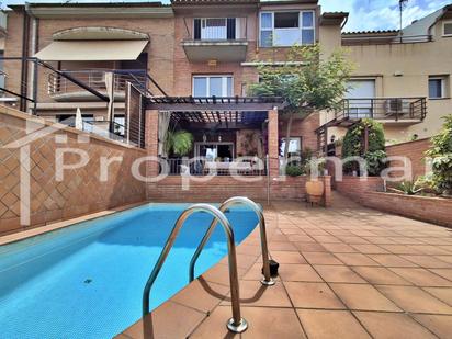 Exterior view of Single-family semi-detached for sale in Granollers  with Air Conditioner, Heating and Private garden