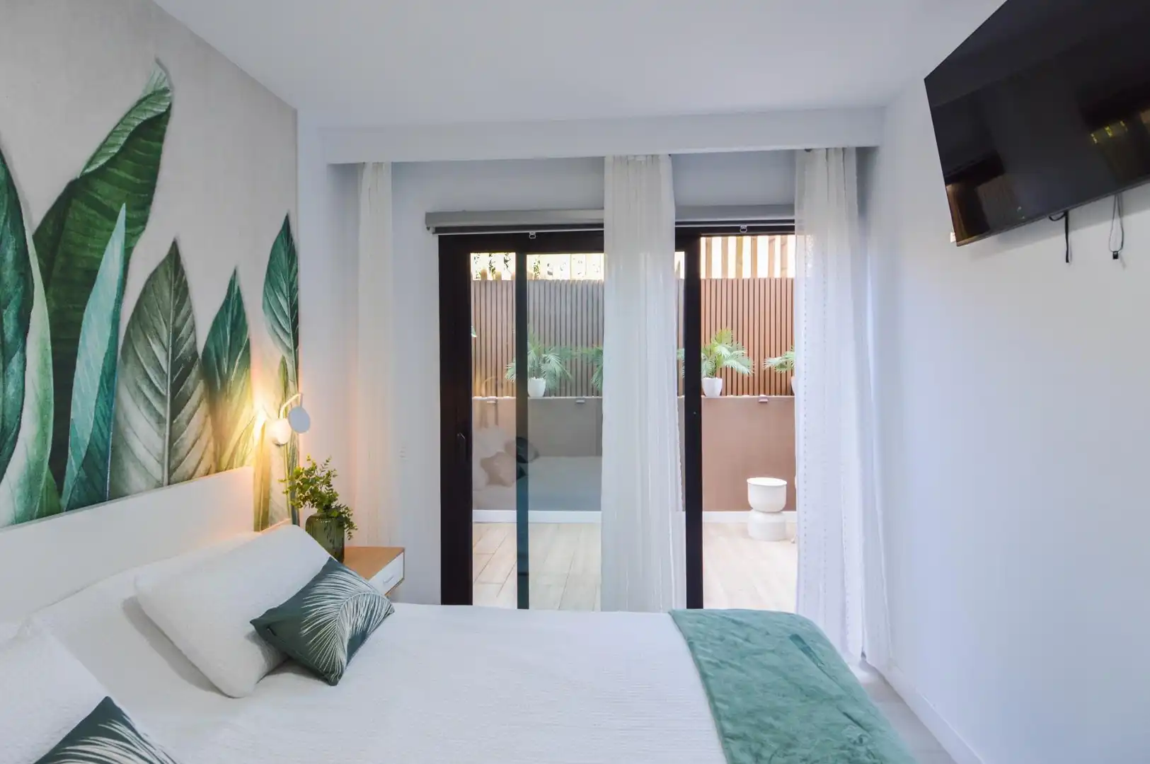 Dormitori de Apartament de lloguer en Mogán amb Aire condicionat, Jardí privat i Terrassa