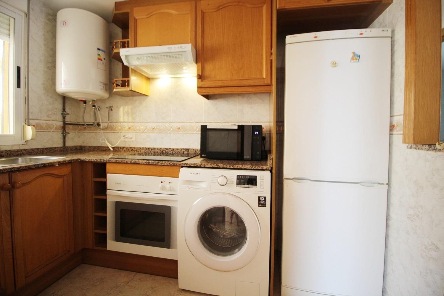 Kitchen of Apartment for sale in Oropesa del Mar / Orpesa  with Air Conditioner, Private garden and Terrace