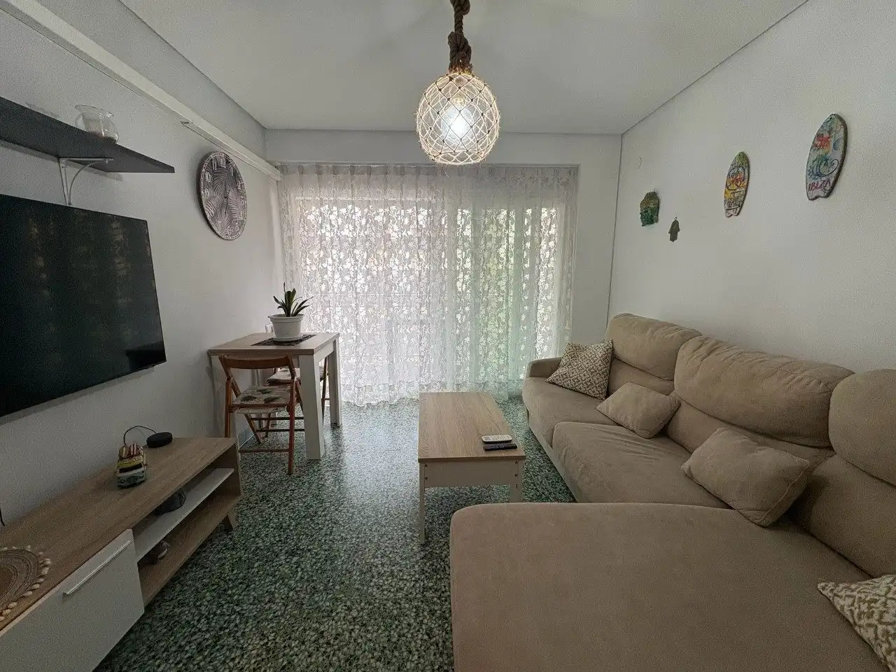 Wohnzimmer von Wohnung zum Verkauf in Cullera mit Klimaanlage, Privatgarten und Terrasse